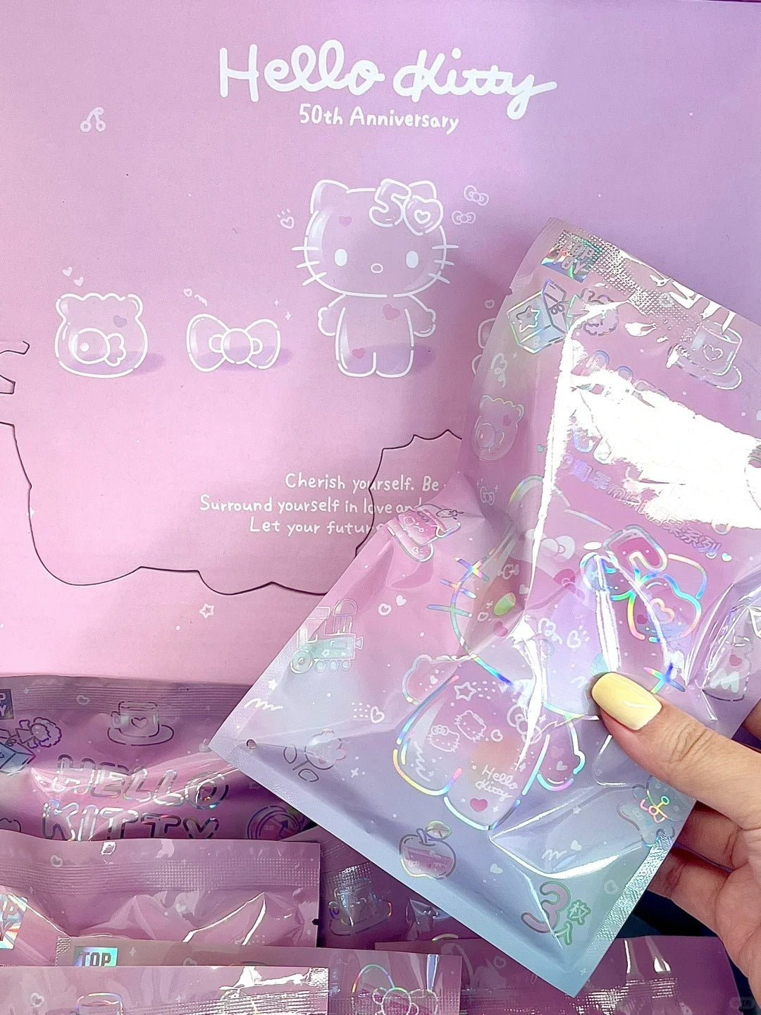 Hello Kitty 50th Anniversary mini doll blind bag (3 pcs in a bag) | Dragon's Lair Comics and Fantasy Houston TX