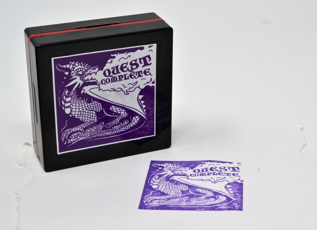 RPG Stamp: Quest Complete | Dragon's Lair Comics and Fantasy Houston TX