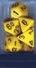 Chessex 25402 Opaque Yellow and Black Poly 7 Dice Set | Dragon's Lair Comics and Fantasy Houston TX
