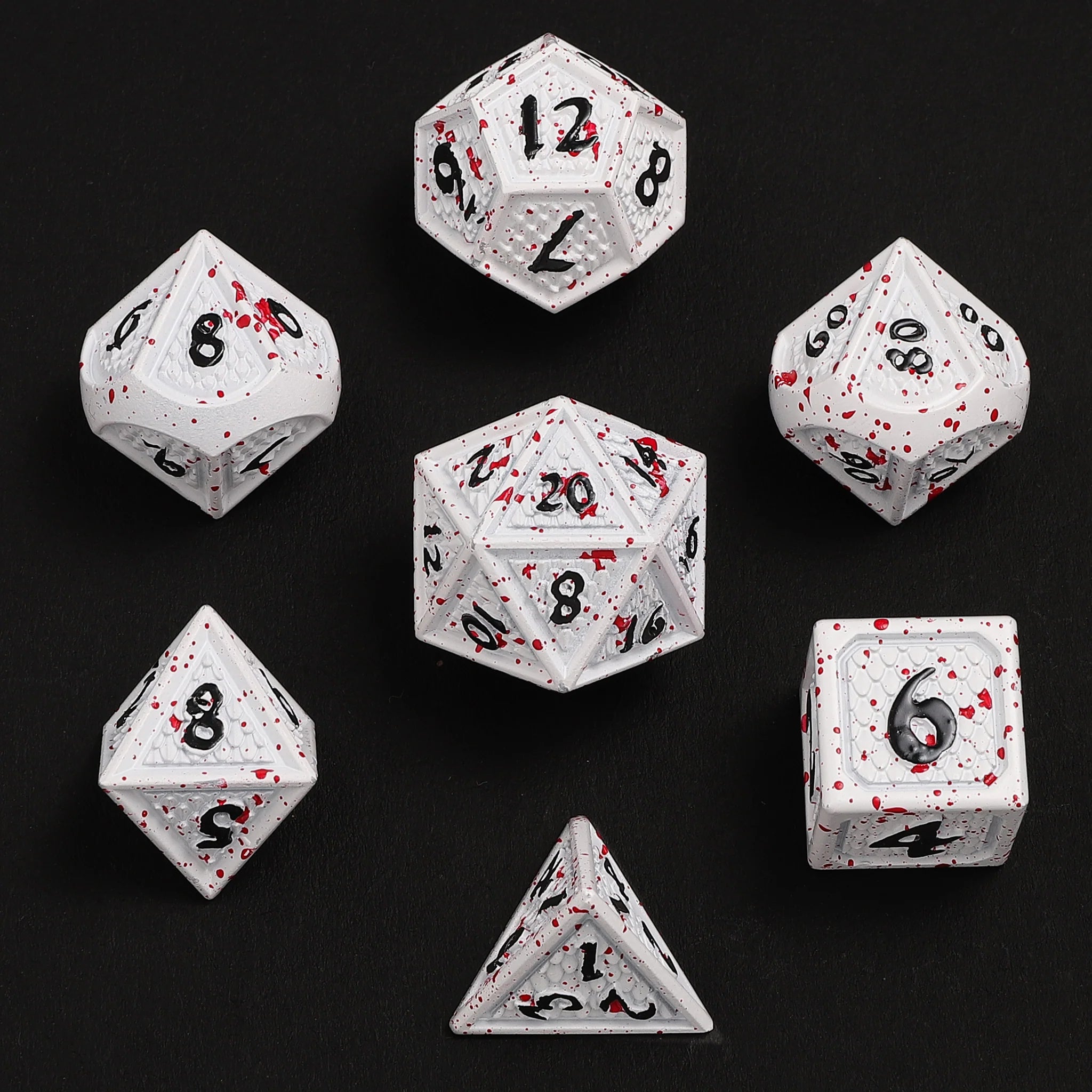 HYMGHO -Solid Metal Behemoth Dice set - Blood Splatter | Dragon's Lair Comics and Fantasy Houston TX