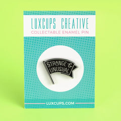 Strange & Unusual Enamel Pin | Dragon's Lair Comics and Fantasy Houston TX