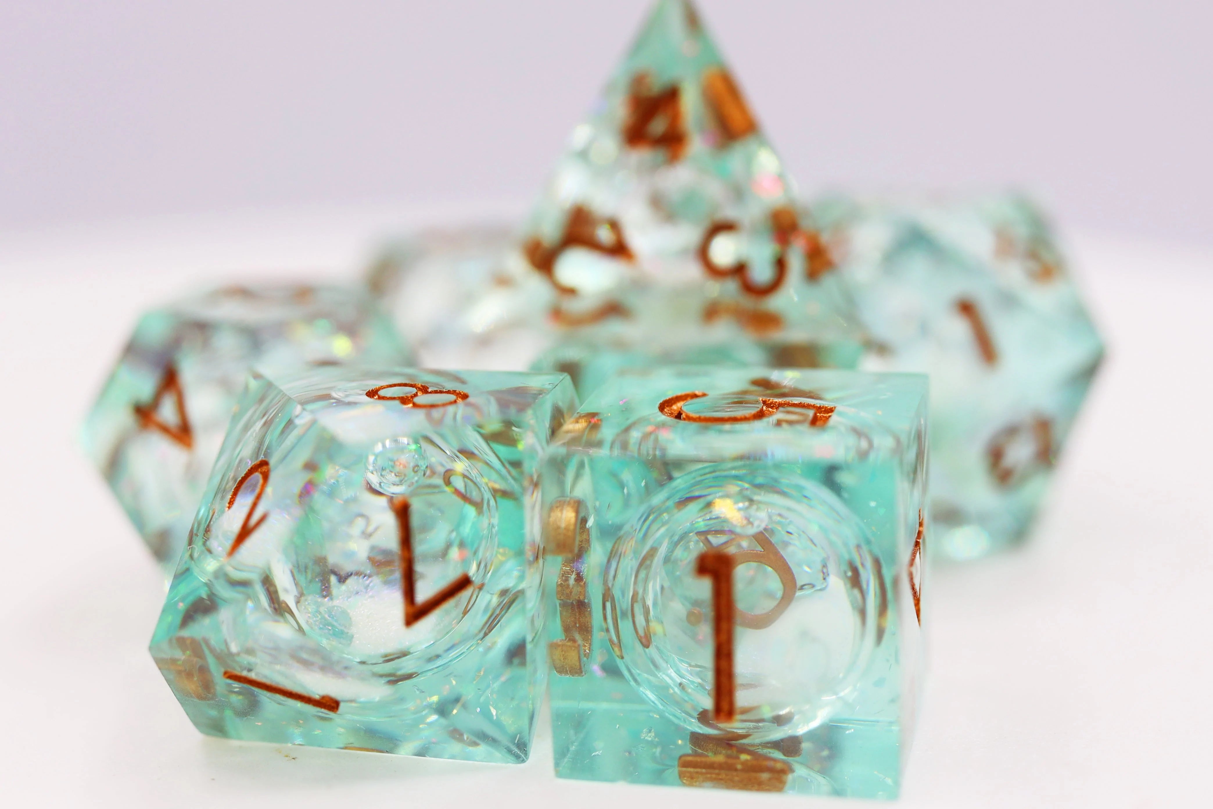 Foam Brain Poly 7 Dice Set: Hand-Polished Liquid Core Green | Dragon's Lair Comics and Fantasy Houston TX