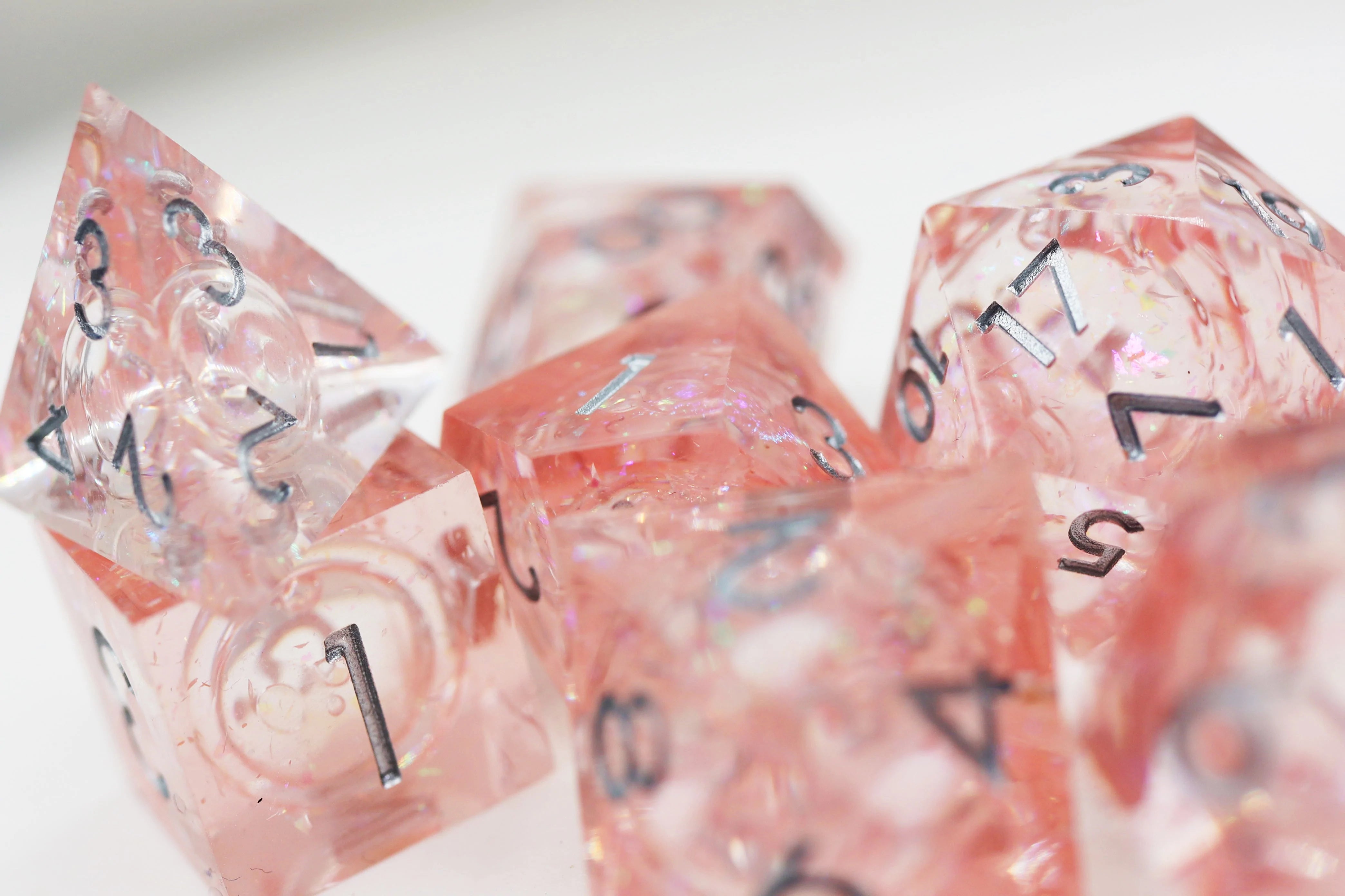 Foam Brain Poly 7 Dice Set: Hand-Polished Liquid Core Pink | Dragon's Lair Comics and Fantasy Houston TX