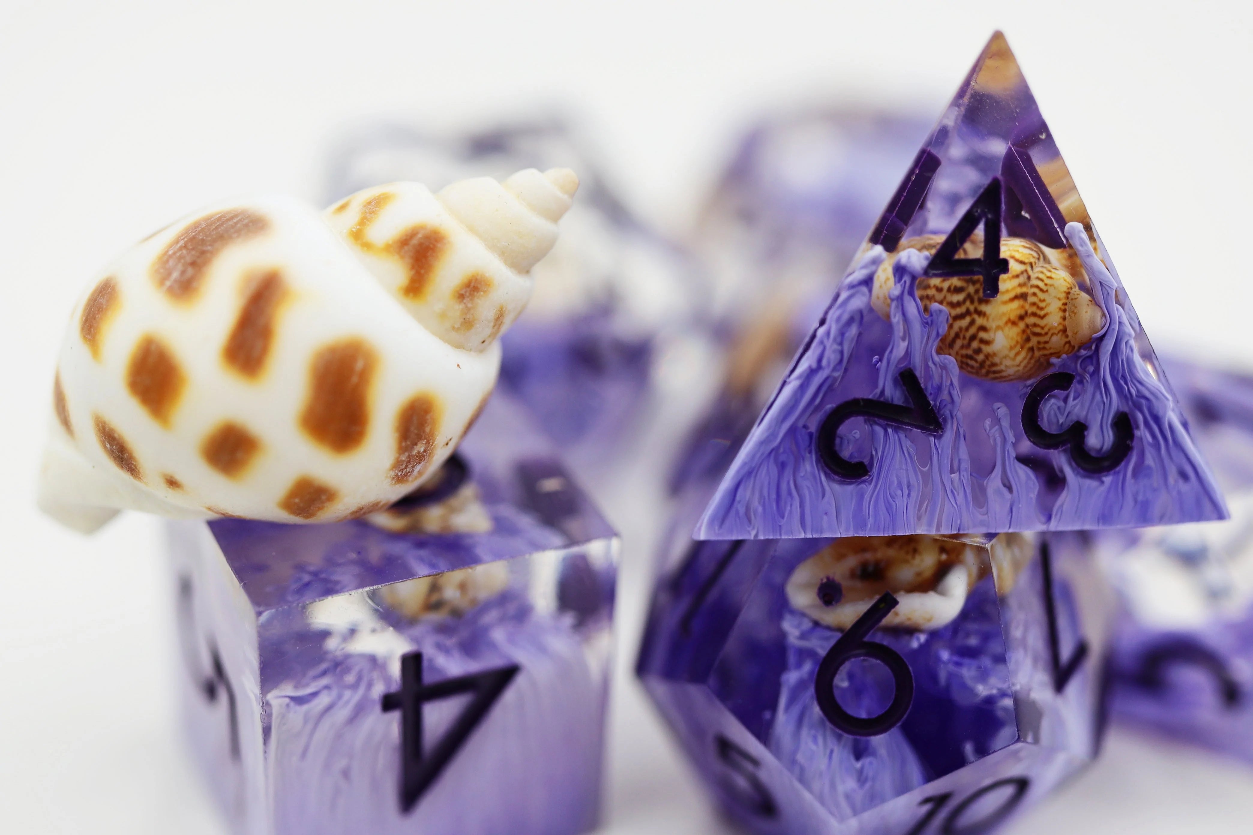 Foam Brain Poly 7 Dice Set: Hand-Polished Sharp-Edge Purple Coral | Dragon's Lair Comics and Fantasy Houston TX