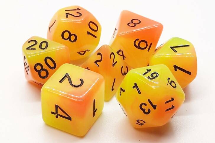 Old School Dice Glow Orange & Yellow Poly 7 Set | Dragon's Lair Comics and Fantasy Houston TX